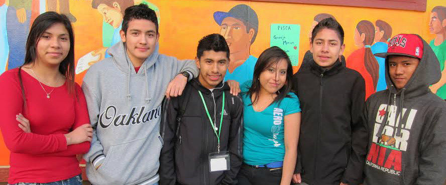 CAPACES youth smile at camera