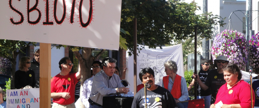 A man giving a speech at a rally