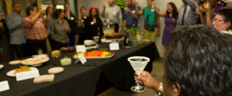 Everyone raises their glass at an MRG event