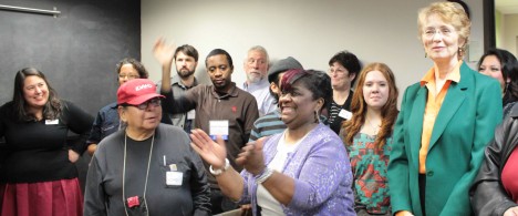 A group of people celebrate with Sharon Gary-Smith at 2015 Open House