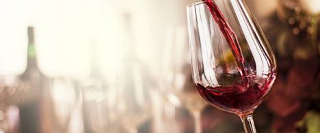 red wine pouring in a restaurant